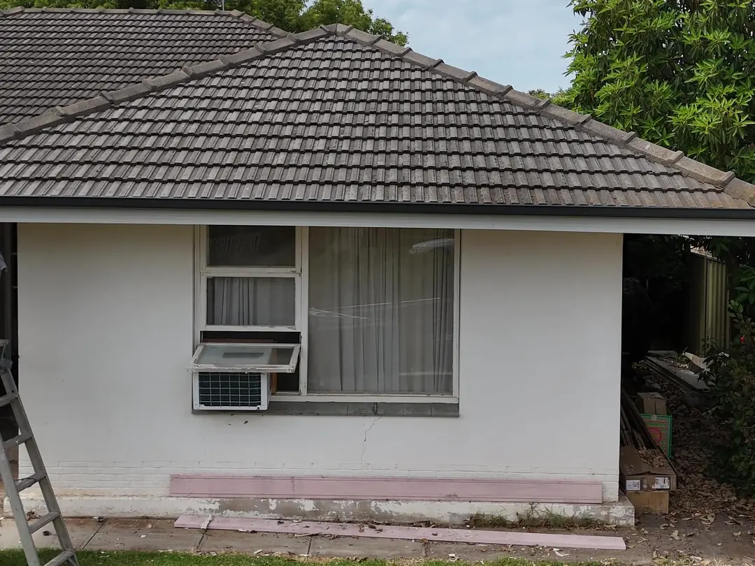 After: new fascia and gutter along the front of the house